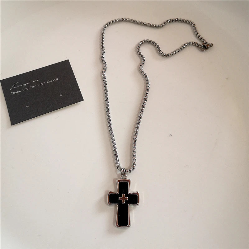 BLACK CROSS NECKLACE®